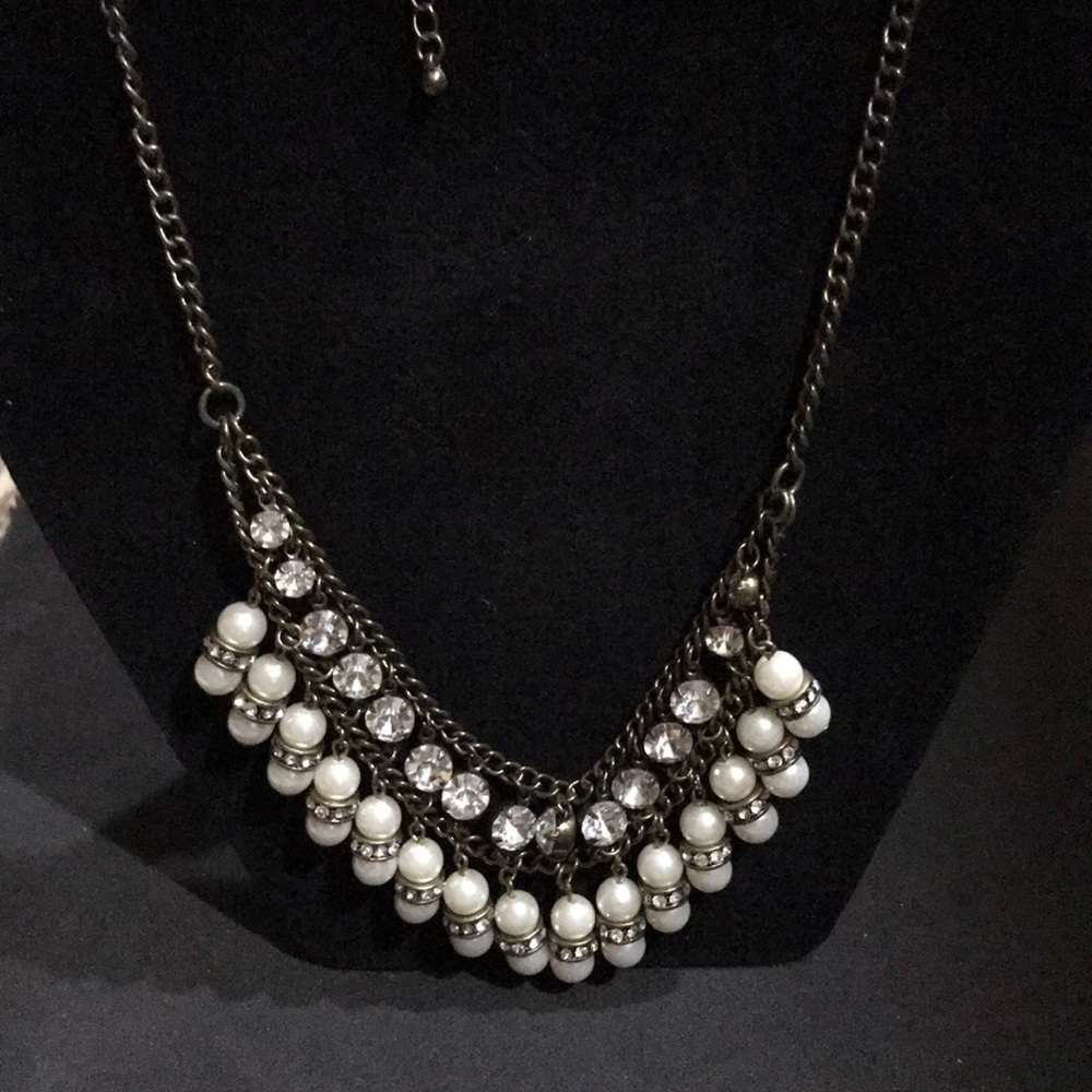Gold pearl statement necklace.